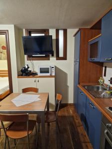 Η κουζίνα ή μικρή κουζίνα στο L'Oasi in centro città