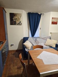 Ένα ή περισσότερα κρεβάτια σε δωμάτιο στο L'Oasi in centro città +8 φωτογραφίες