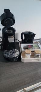 Kaffe- og tefaciliteter på Appartement proche Metz Luxembourg