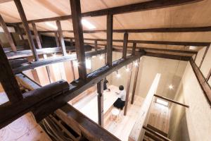 an overhead view of a person standing in a building at Shizuya KYOTO in Kyoto