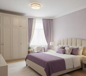 a bedroom with a large bed and a window at La-Sa Apart Hotel in Icmeler