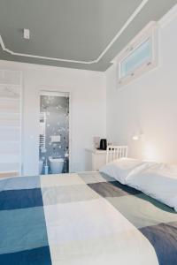 Ένα ή περισσότερα κρεβάτια σε δωμάτιο στο A Casa Di Lu Na 3