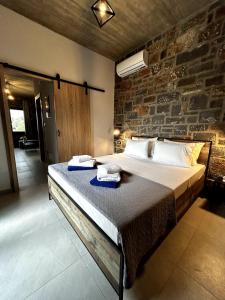 Ένα ή περισσότερα κρεβάτια σε δωμάτιο στο DOXA PETRA Small villa with pool