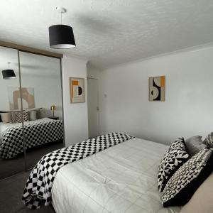 Ένα ή περισσότερα κρεβάτια σε δωμάτιο στο Bob & Beths