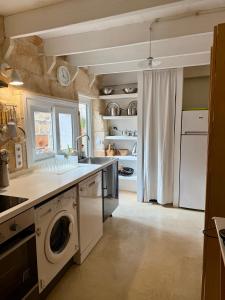 Kuchyň nebo kuchyňský kout v ubytování Caseta típica amb encant al Casc antic Ciutadella + 3 fotografie