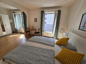 Ένα ή περισσότερα κρεβάτια σε δωμάτιο στο Stadt Zimmer