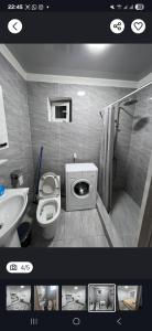 a bathroom with a toilet and a sink at Guest House in Talghar