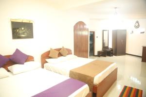 Postel nebo postele na pokoji v ubytování Enlivened Ella