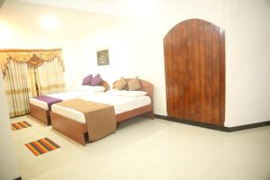 Postel nebo postele na pokoji v ubytování Enlivened Ella