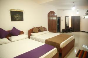 Postel nebo postele na pokoji v ubytování Enlivened Ella