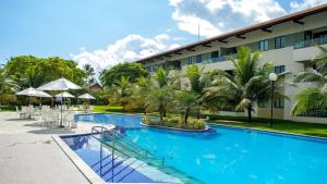 Bazén v ubytování Carneiros Beach Resort by CTA nebo v jeho okolí + 12 fotografií