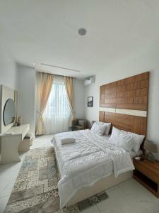 Postel nebo postele na pokoji v ubytování Luxury 3BR in Lekki