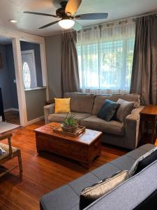 a living room with a couch and a coffee table at New Leeds listing Near Graces diner and Hudson! in Catskill