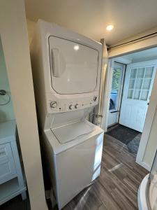 a white refrigerator with its door open in a kitchen at New Leeds listing Near Graces diner and Hudson! in Catskill