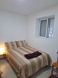 Postel nebo postele na pokoji v ubytování The Heart of Moutoullas