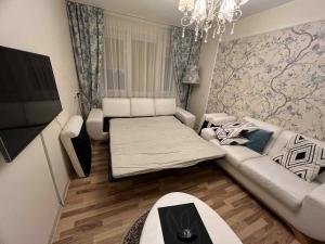 Ένα ή περισσότερα κρεβάτια σε δωμάτιο στο KT cosy hillside apartment