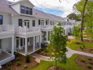 an aerial view of a house with a yard at 517 The Southend Pier House in Virginia Beach
