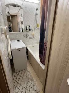 Koupelna v ubytování KT cosy hillside apartment + 9 fotografií