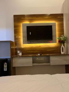 Et tv og/eller underholdning på Orchid suites