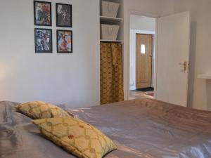 Ένα ή περισσότερα κρεβάτια σε δωμάτιο στο Lambs Cottage +3 φωτογραφίες