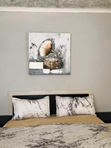 Postel nebo postele na pokoji v ubytování RMB Luxury Lodge