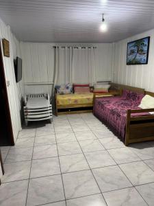 マチーニョスにあるCasa da Moisesのベッドルーム1室(ベッド2台付)が備わります。