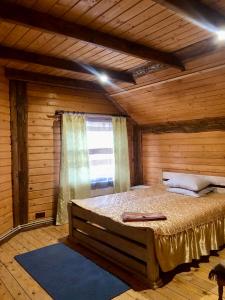 Ένα ή περισσότερα κρεβάτια σε δωμάτιο στο Cottage