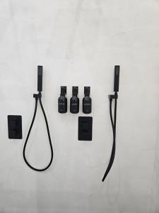 a wall with four electrical devices on a wall at La suite Cherbourgeoise in Cherbourg en Cotentin
