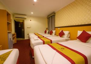 Ένα ή περισσότερα κρεβάτια σε δωμάτιο στο فندق رفاق مكة