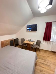 TV a/nebo společenská místnost v ubytování LISINGTAL COSY ROOMS Exit St Michael + 27 fotografií