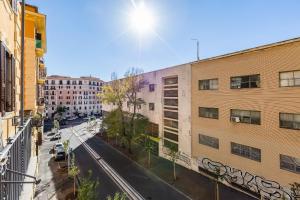 a view of a city street with buildings at Relais San Giovanni in Rome