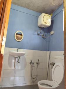 Koupelna v ubytování Sylvan homestay