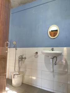 Koupelna v ubytování Sylvan homestay