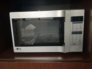 Η κουζίνα ή μικρή κουζίνα στο A Place in the Sky - c23 Calacoto