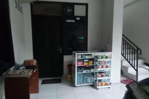 a refrigerator with its door open in a room at JJ House Kost Exclusive Nologaten in Yogyakarta