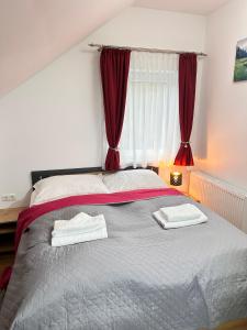 Postel nebo postele na pokoji v ubytování LISINGTAL COSY ROOMS Exit St Michael