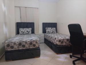 Ένα ή περισσότερα κρεβάτια σε δωμάτιο στο Kerouch house