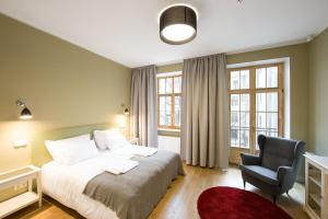 Кровать или кровати в номере Riga Lux Apartments - Skolas +86 фотографий