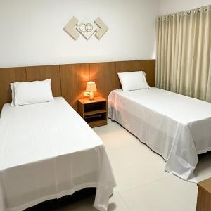 Postel nebo postele na pokoji v ubytování Casa Siena