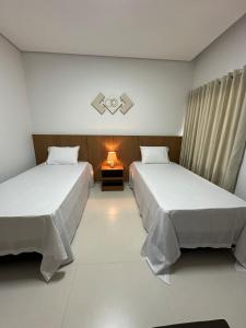 Postel nebo postele na pokoji v ubytování Casa Siena