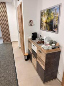 Kuchyň nebo kuchyňský kout v ubytování LISINGTAL COSY ROOMS Exit St Michael