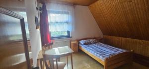 Postel nebo postele na pokoji v ubytování Noclegi Beskidzkie + 12 fotografií