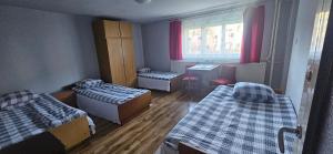 Postel nebo postele na pokoji v ubytování Noclegi Beskidzkie