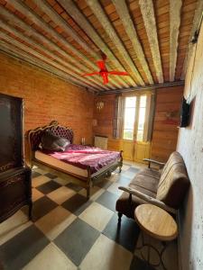 Ένα ή περισσότερα κρεβάτια σε δωμάτιο στο El Granero Apart hotel