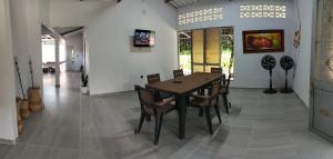 TV a/nebo společenská místnost v ubytování Villa Liam Casa Turística + 13 fotografií