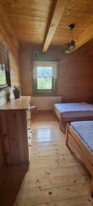 Postel nebo postele na pokoji v ubytování Chata RAIKA