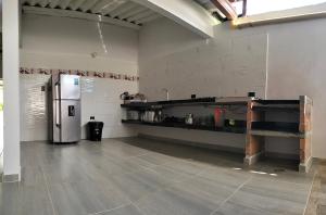 Kuchyň nebo kuchyňský kout v ubytování Villa Liam Casa Turística