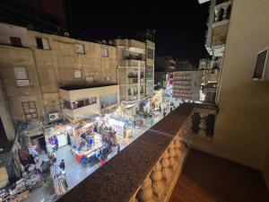 an overhead view of a market at night at Aswan House center in Aswan