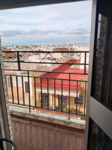 a view of a city from a balcony at El apartamento de Isa tercero sin ascensor in Alcalá de Guadaira