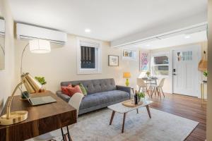 a living room with a couch and a table at Near Downtown & Waterfront, AC, Pet Friendly in Tacoma